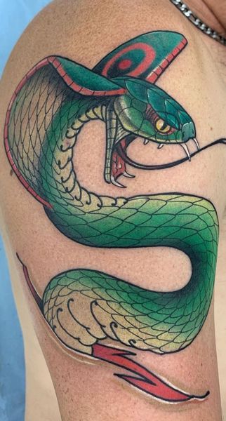 Seb, tatouage d'un serpent vert