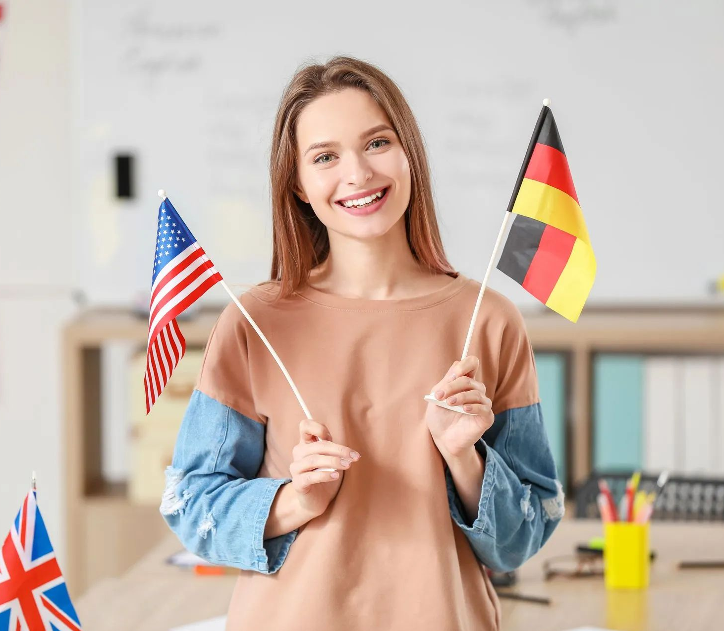 Femme avec les drapeaux des États-Unis et de l'Allemagne