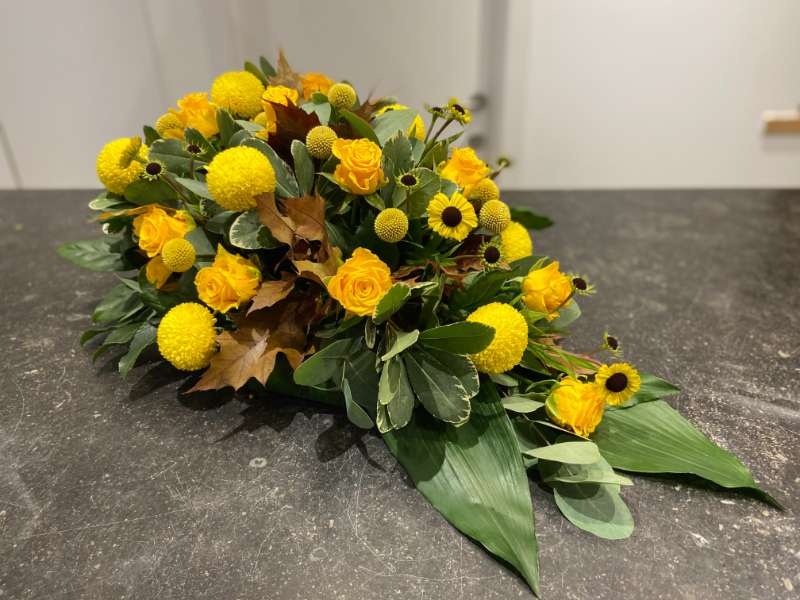 Bloemstuk geel en oranje