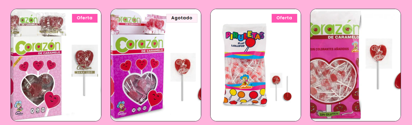Hay muchos tipos diferentes de piruletas sobre un fondo rosa.