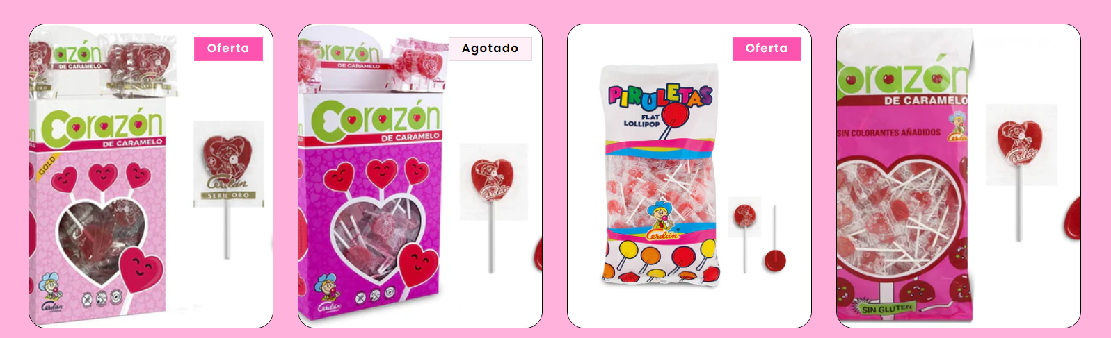 Hay muchos tipos diferentes de piruletas sobre un fondo rosa.