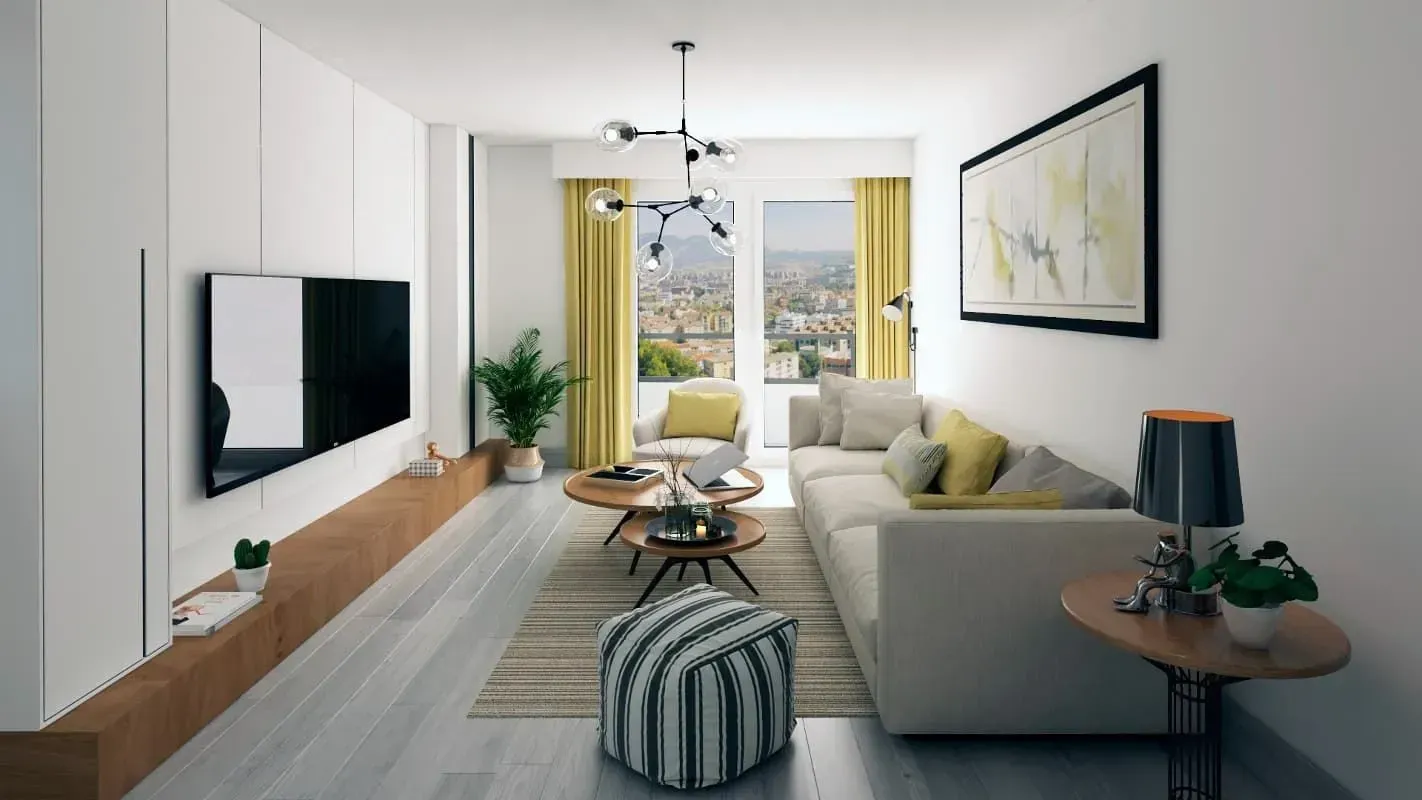 Una sala de estar con sofá, mesa y televisión.