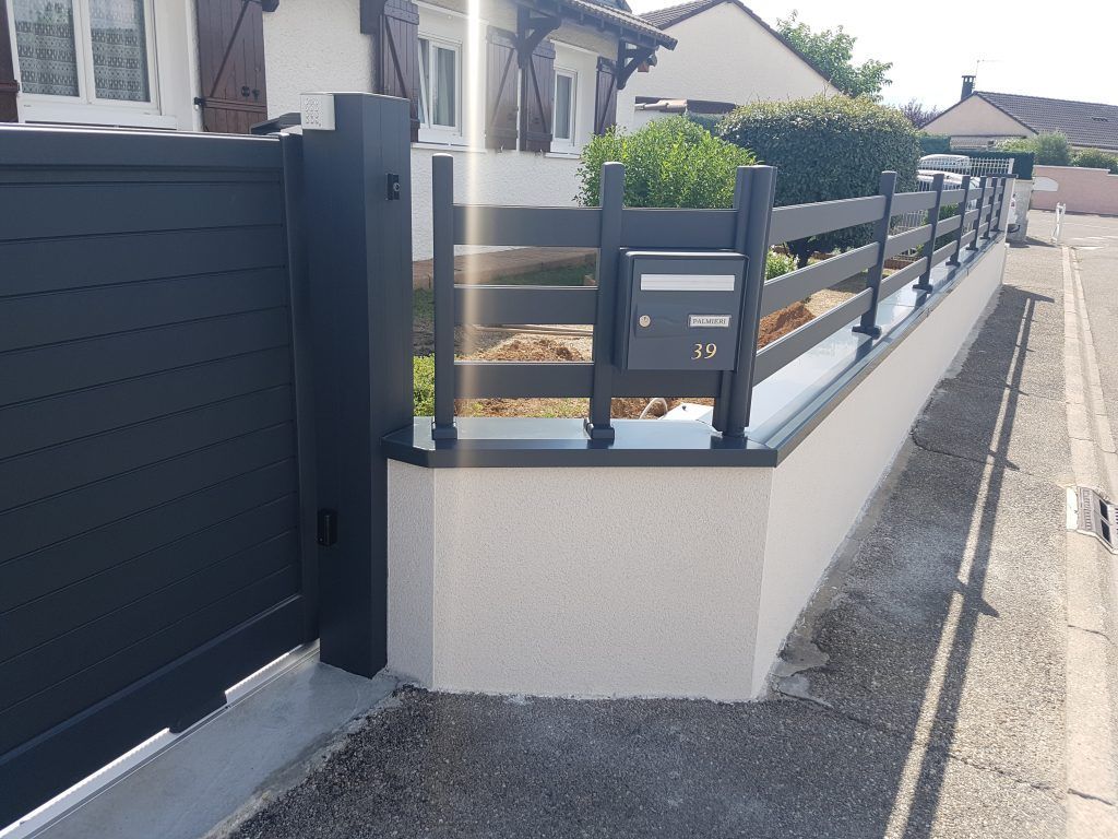 Un portail en alu et clôture