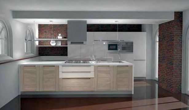 Cocina moderna con isla de madera clara, gabinetes blancos, electrodomésticos de acero inoxidable y detalles de ladrillo.