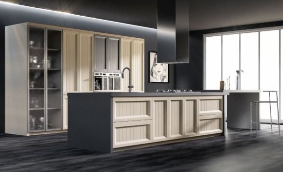 Cocina moderna minimalista con isla negra, armarios color crema y grandes ventanales luminosos.