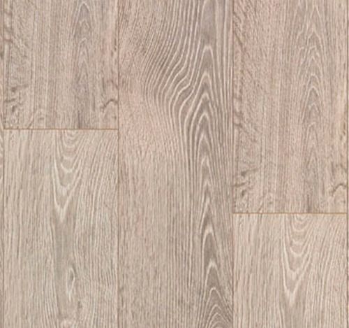 Tablones de suelo de madera de roble claro con un sutil patrón de vetas.