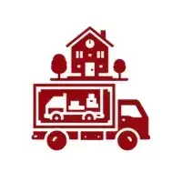 Camión de mudanzas rojo que transporta una casa, árboles y artículos de interior.