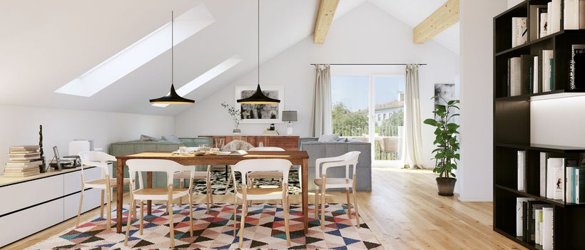 Une salle à manger avec un tapis multicolore