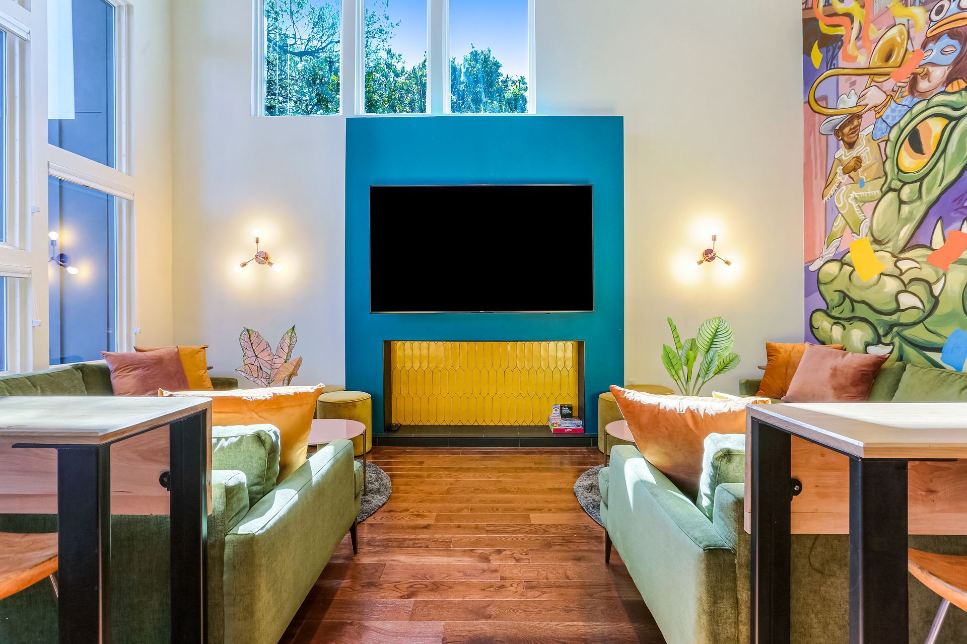 A living room filled with furniture and a flat screen tv.