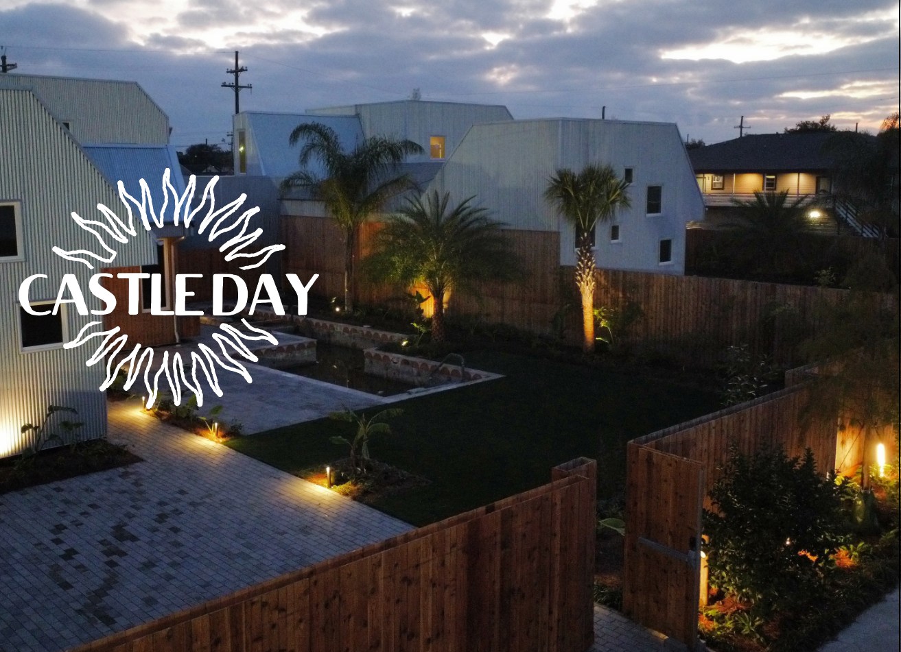 An aerial view of a castle day property at night