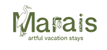 The logo for marais artful vacation stays has a bird on it.