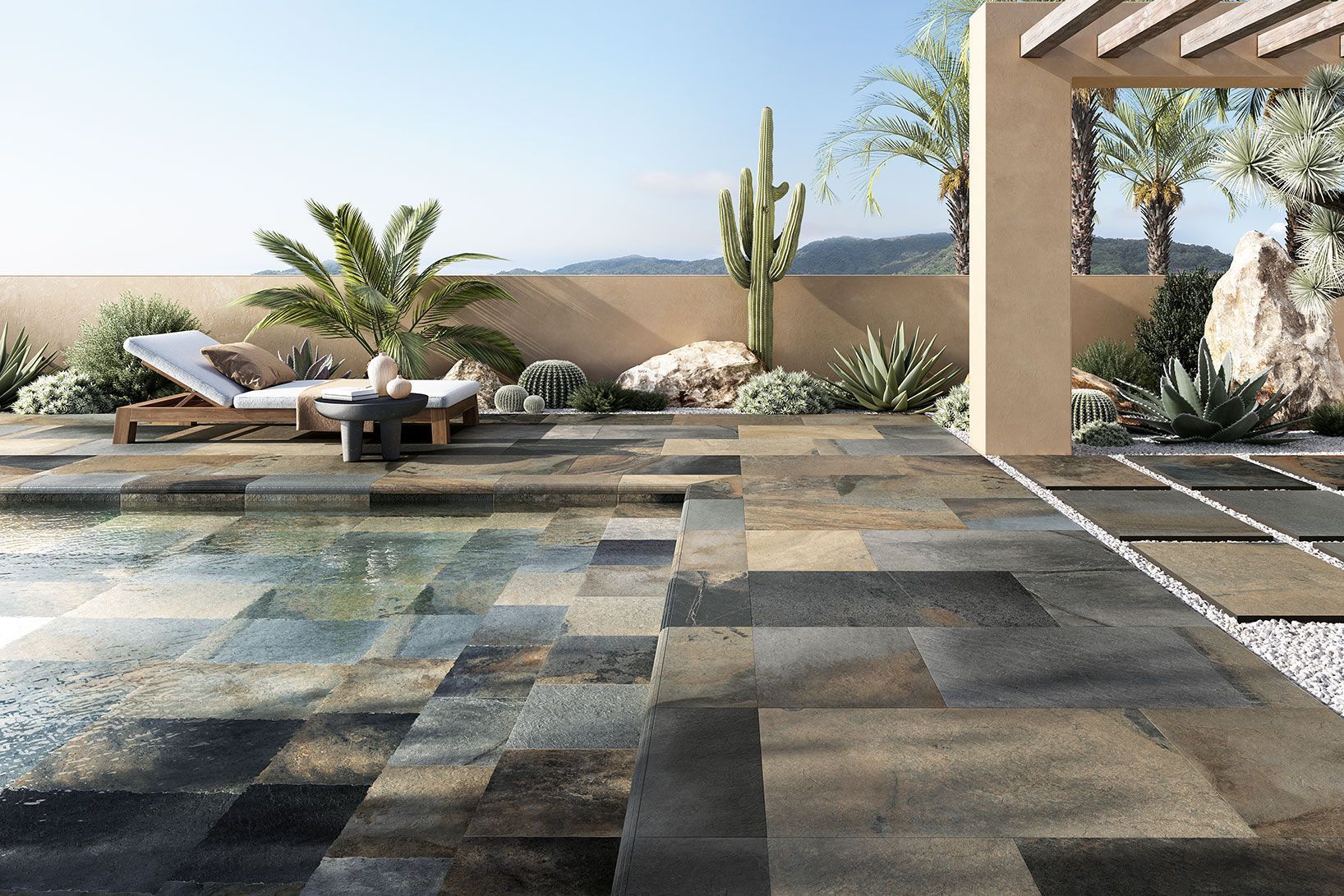 Patio moderne avec chaises longues, plantes en pot et sol en pierre à motifs.