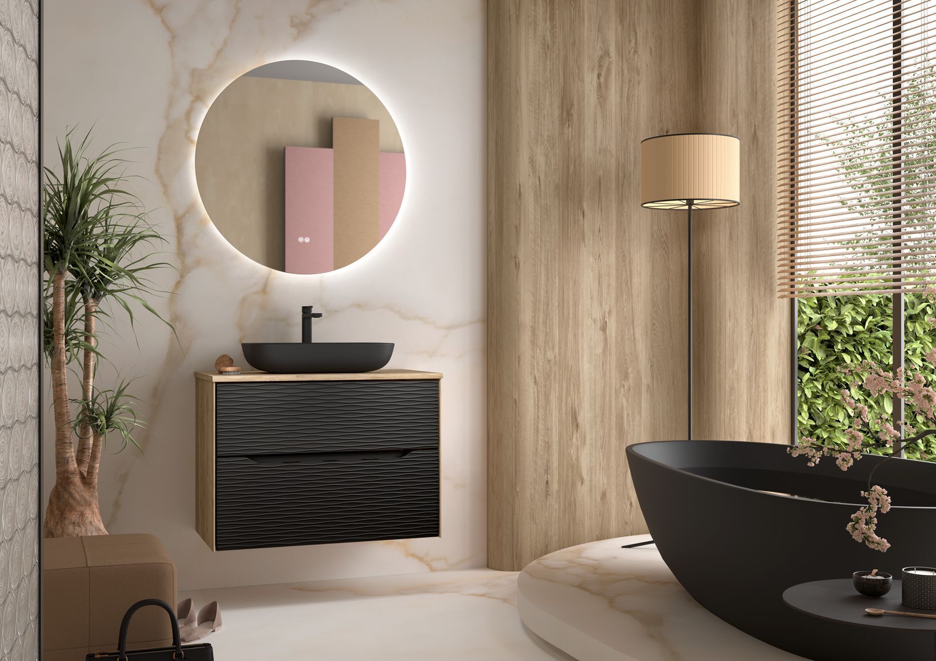 Salle de bains moderne avec meuble lavabo noir, miroir rond, murs beiges et baignoire îlot près d'une fenêtre.