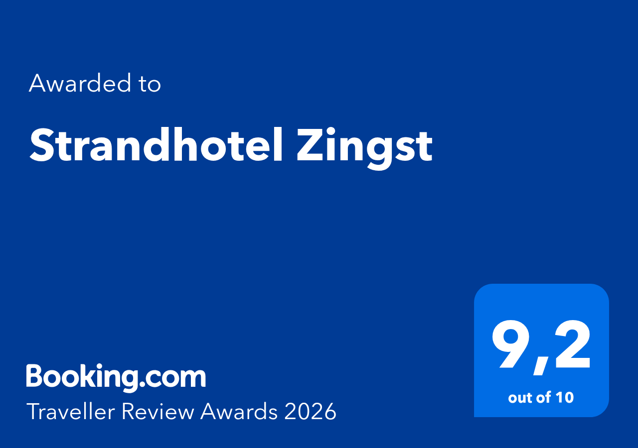 Booking.com Traveller Review Awards 2026-Auszeichnung für das Strandhotel Zingst, Bewertung 9,2 von 10 Punkten auf blauem Hintergrund
