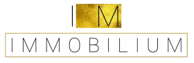 Logotipo Inmobilium en letras negras y doradas