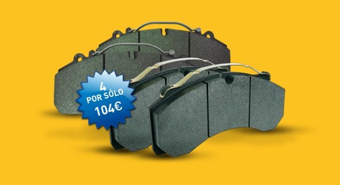 Un par de pastillas de freno sobre un fondo amarillo