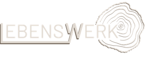 Ein hellorangefarbenes Logo mit einem großen „T“ über dem kursiven Wort „weßler“ auf weißem Hintergrund.