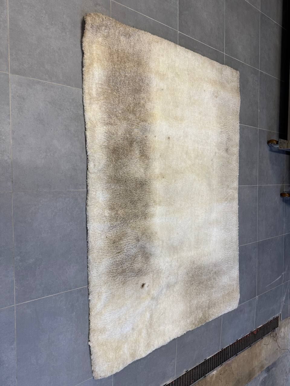 Tapis avant nettoyage