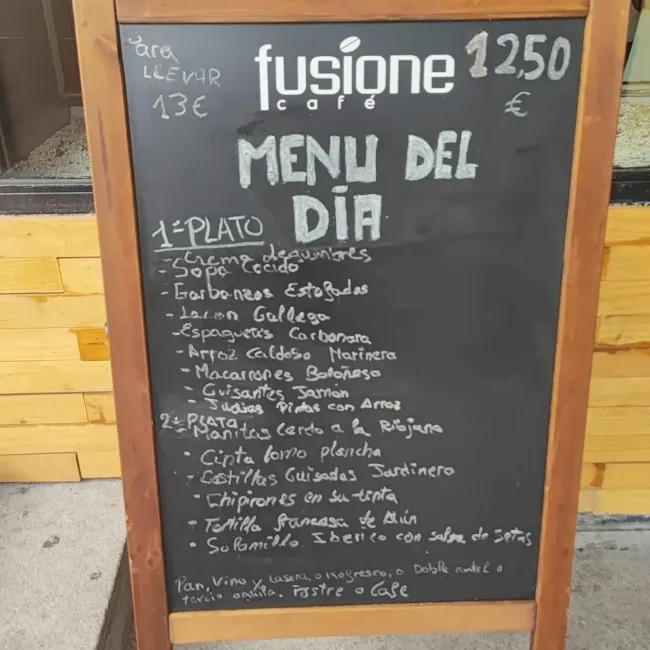 Una pizarra con Fusione 1250 escrito en ella