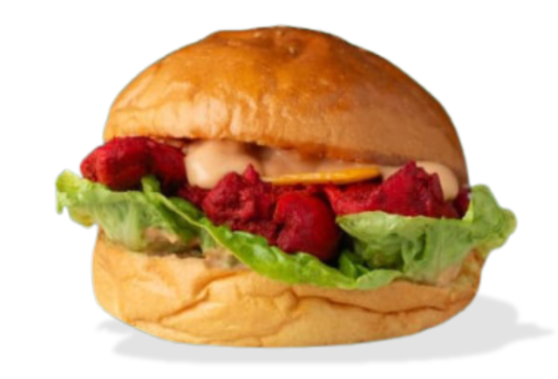 Hamburguesa en pan con carne roja, lechuga y salsa.
