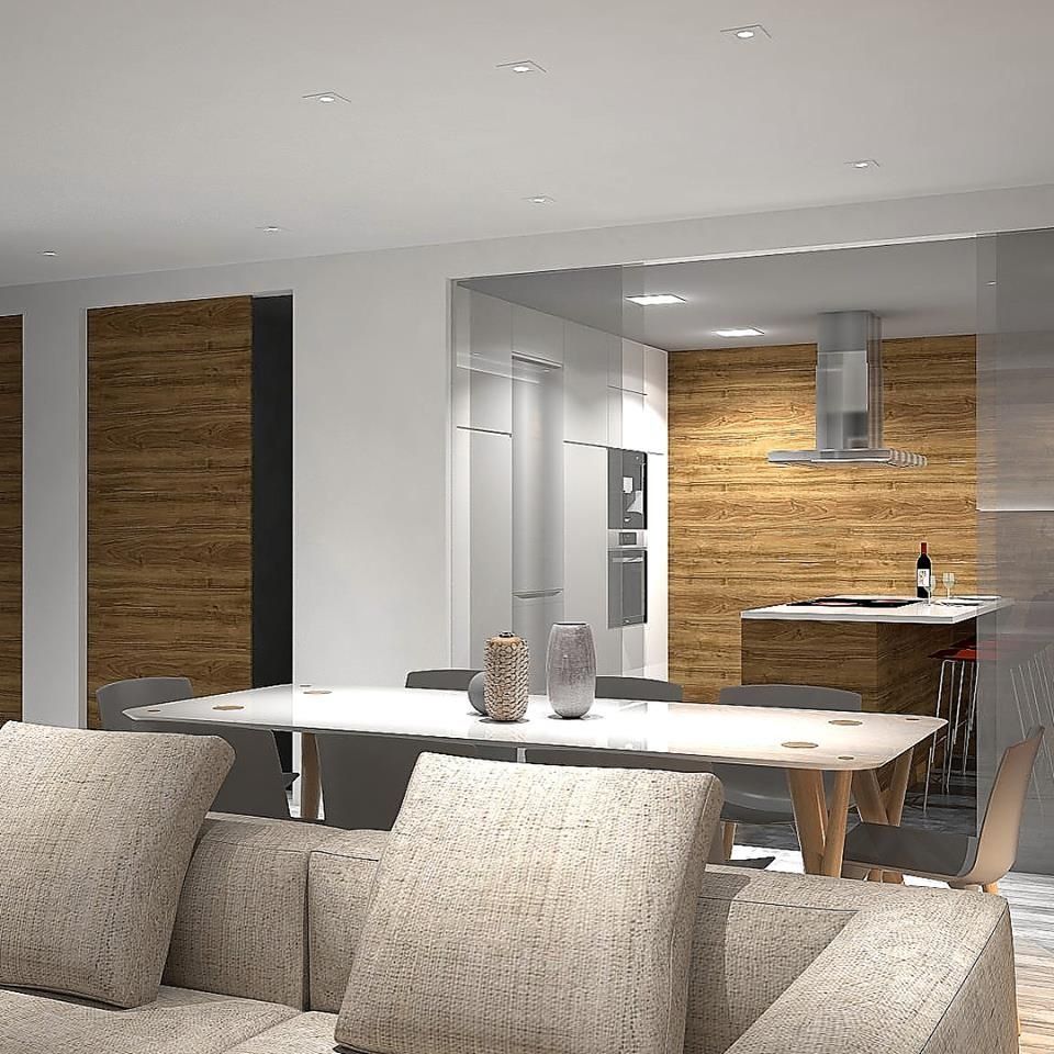 Una sala de estar con un sofá y una mesa