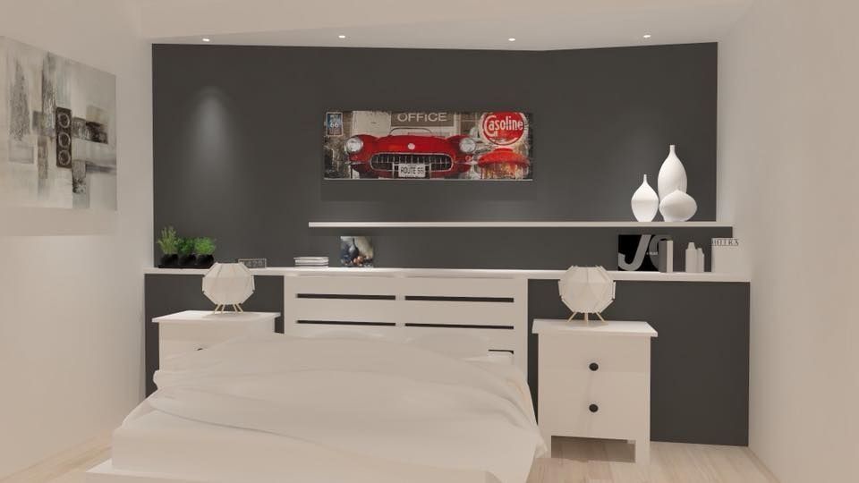 Un dormitorio con una cama, mesitas de noche y un cuadro en la pared.