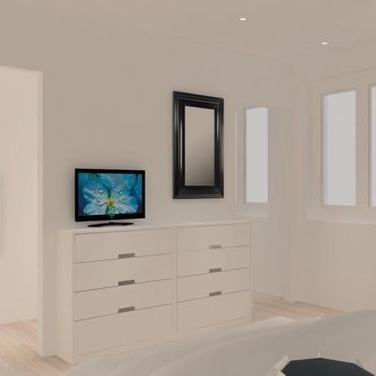 Un dormitorio con una cómoda, un televisor y un espejo.