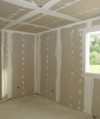 Travaux d'isolation, pose de plaque de plâtre.