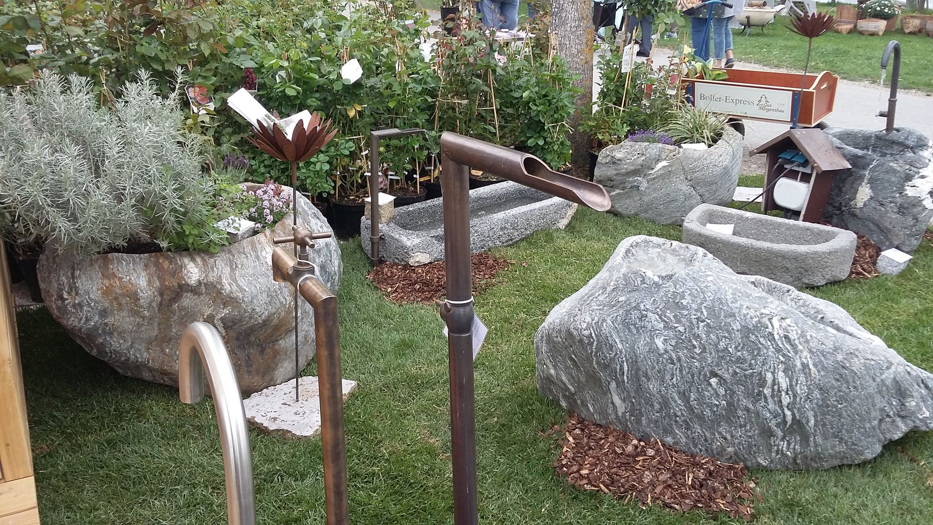 Wasserhahn in einem Garten