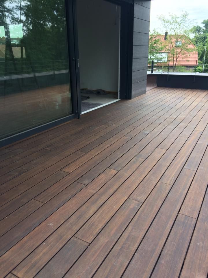 Holzterrasse mit hinterlüfteter Fassade mit Rockpanel