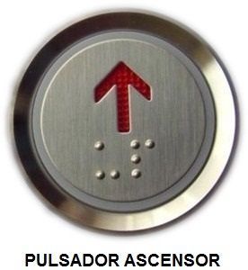 Un botón de ascensor pulsador con una flecha roja apuntando hacia arriba
