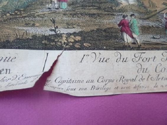 Dégradation: bas de la gravure déchirée