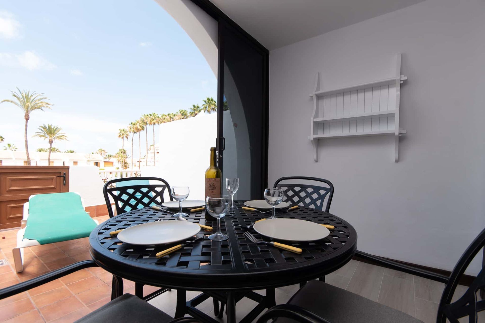 Terrace with patio table and chairs, and 2 sun loungers at Parque Santiago II, Playa de las Americas, Tenerife