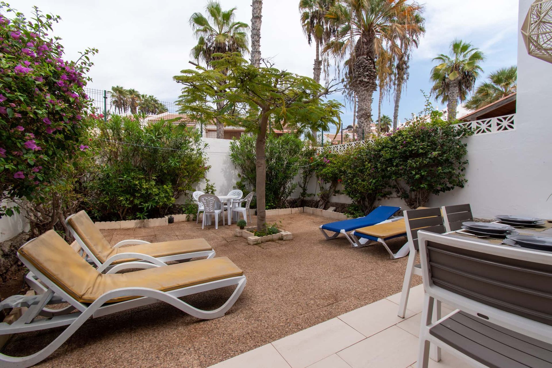 Terrace with patio table and chairs, sun loungers, Parque Santiago I, Playa de las Americas, Tenerife