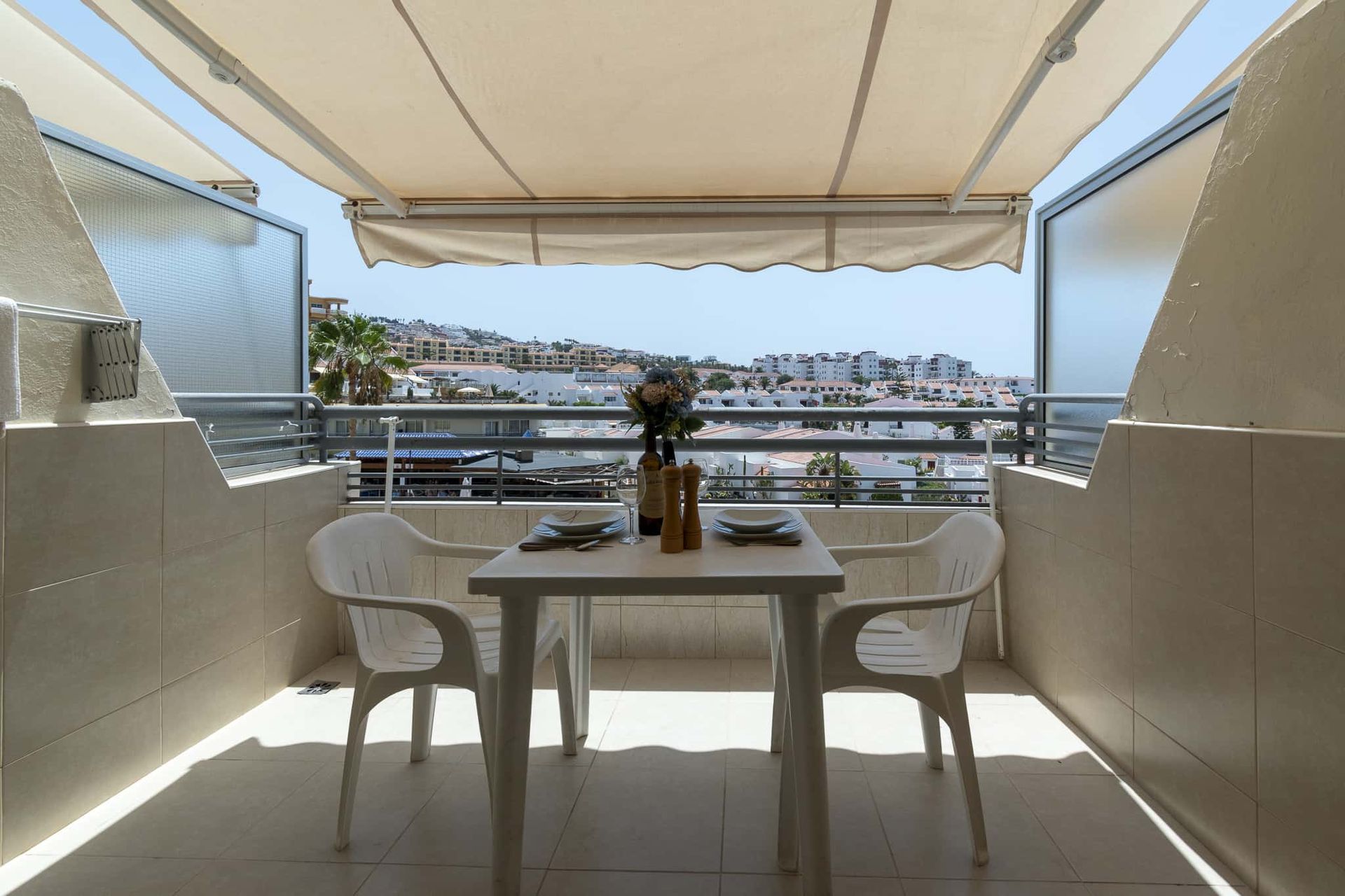 Balcony with patio table and chairs, sun awning, clothes airer, Santa Maria, Costa Adeje, Tenerife