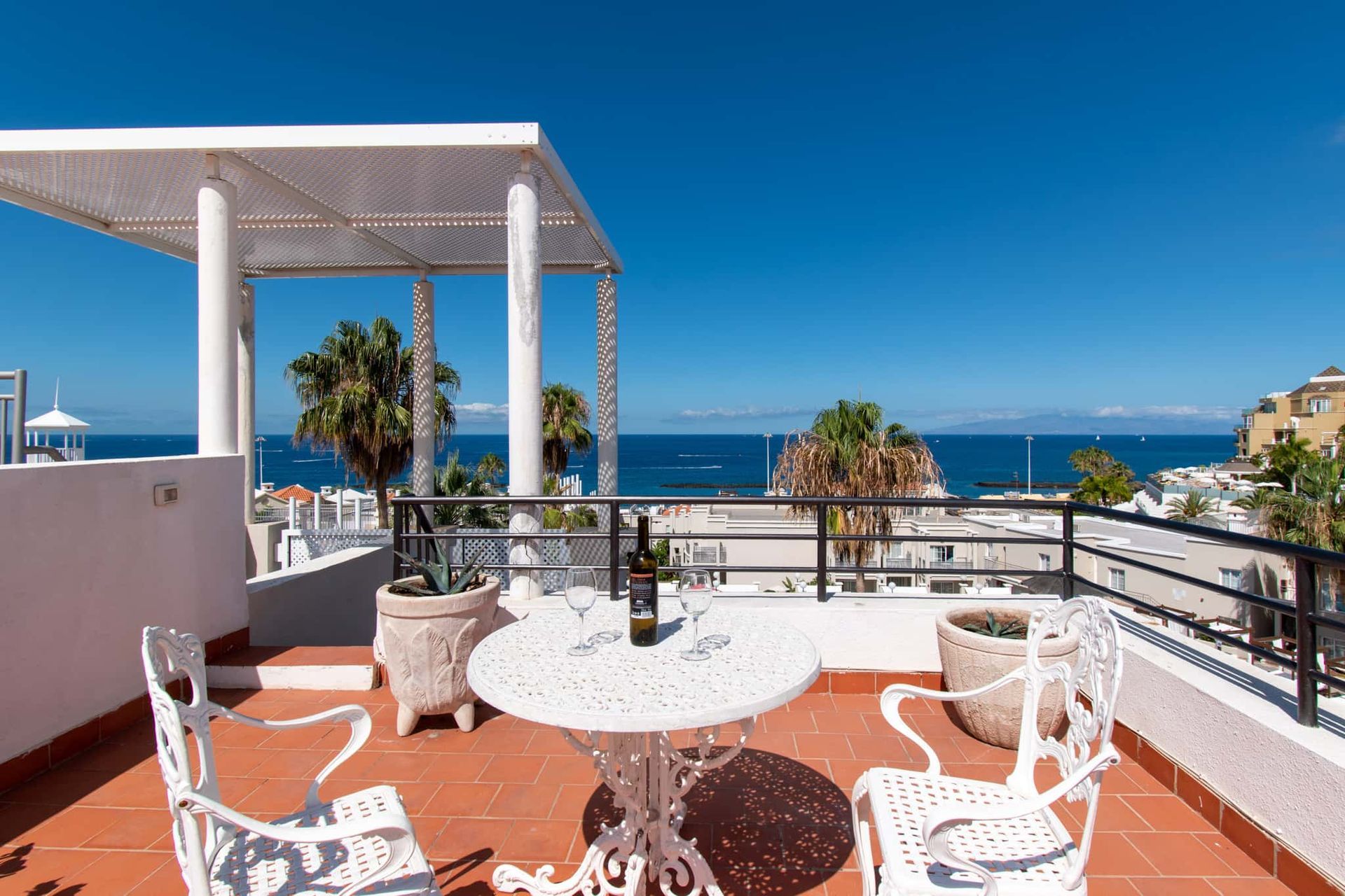 Roof terrace with patio table and chairs, with sea views, Los Olivos, Costa Adeje, Tenerife.