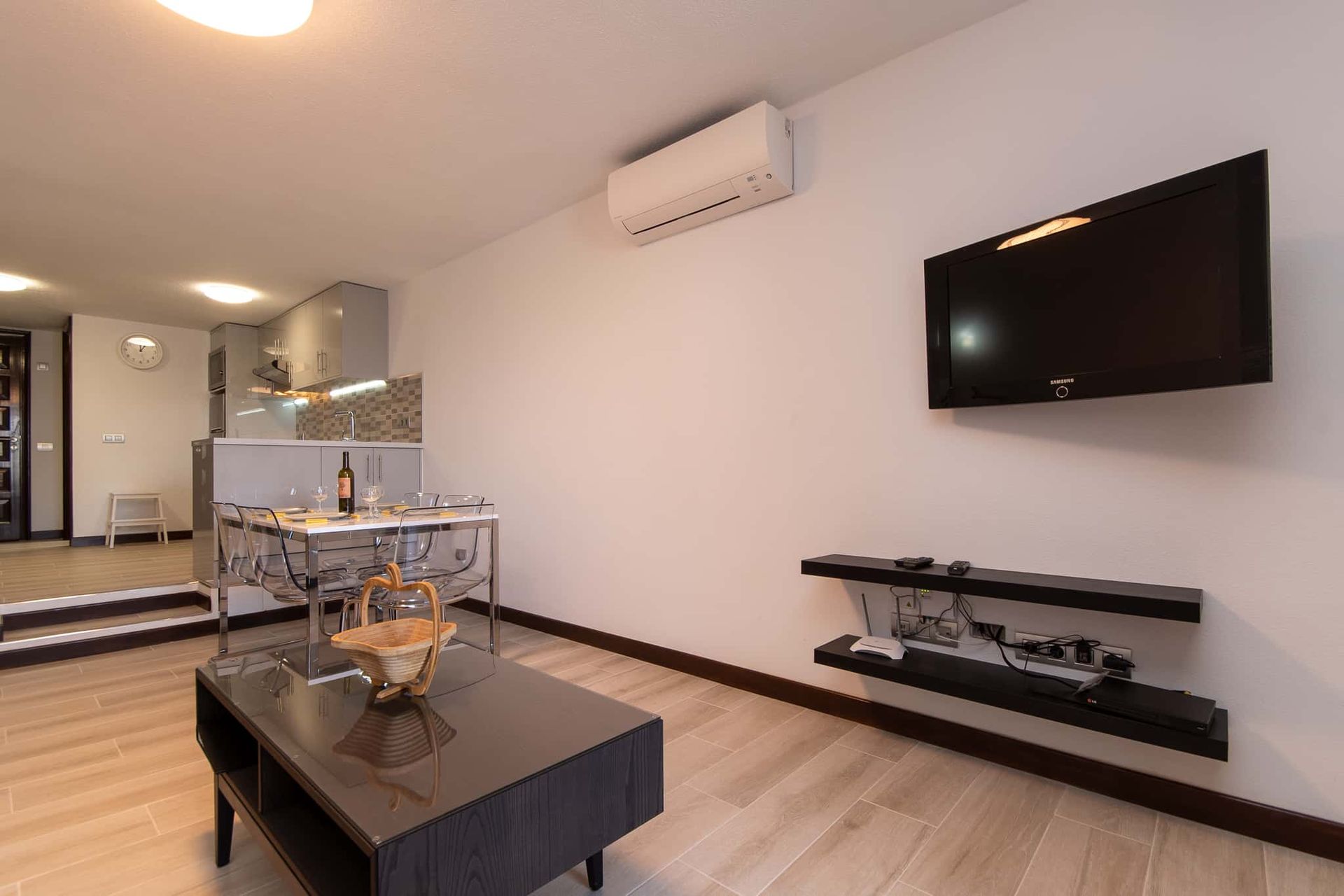 Wall mounted flat screen TV, coffee table, dining table and chairs, air conditioning at Parque Santiago II, Playa de las Americas, Tenerife