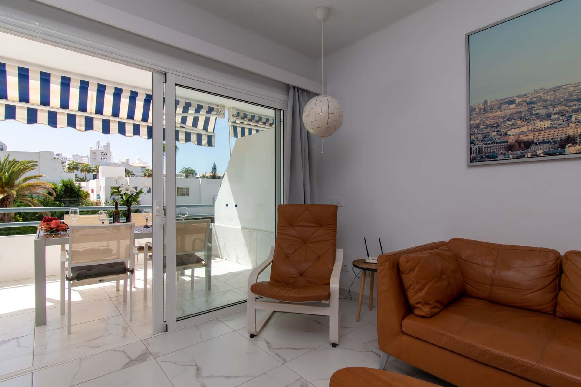 Lounge with sofa, armchair, wifi router, Club Atlantis, Costa Adeje, Tenerife.