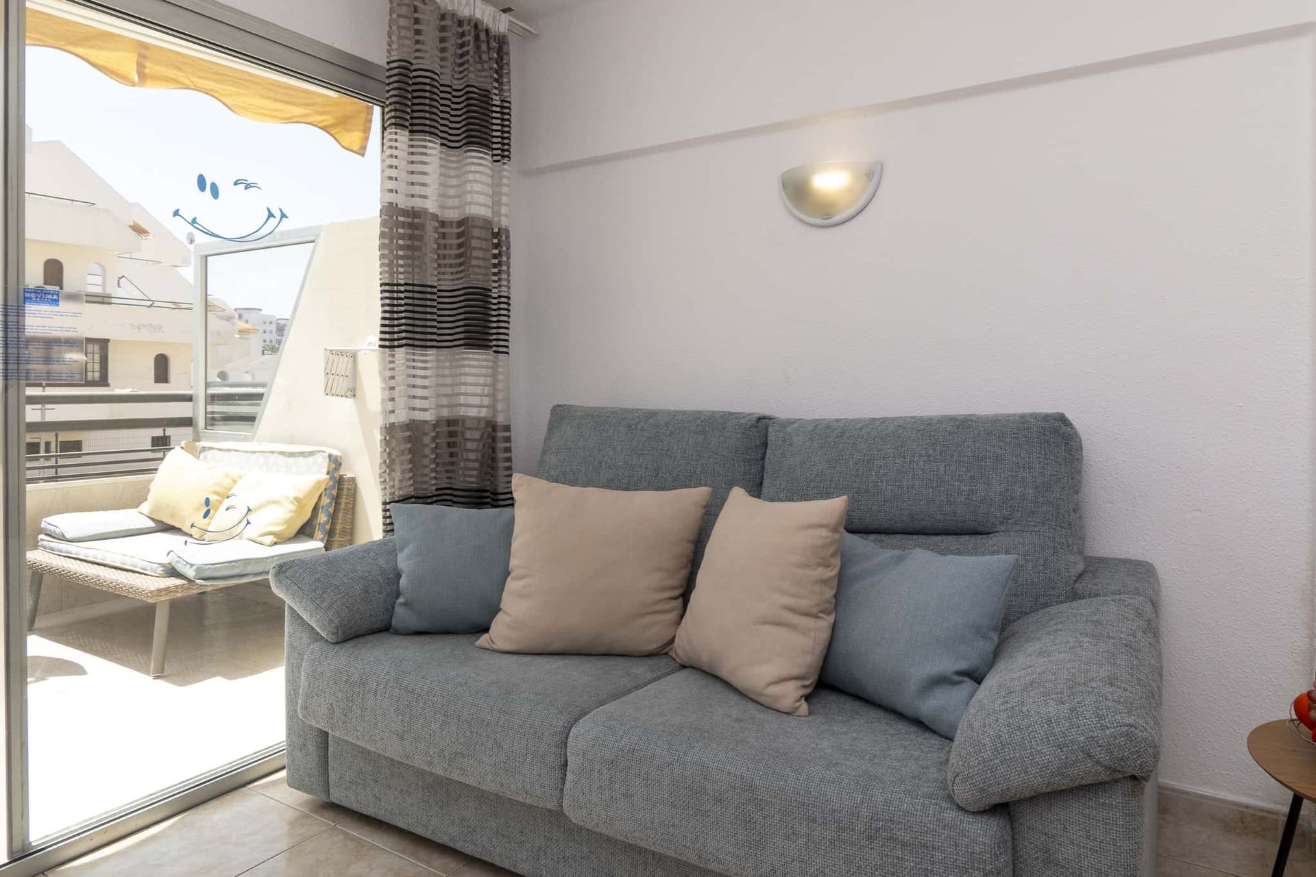 Lounge with sofa, patio doors leading out to balcony, Santa Maria, Costa Adeje, Tenerife