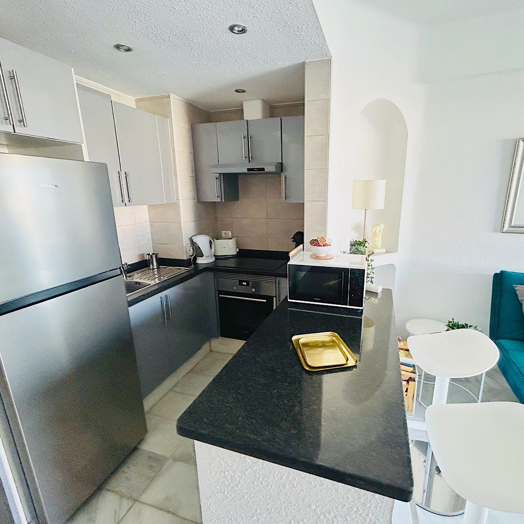 There is a cute dining area in this lovely one bedroom apartment at Club Atlantis.