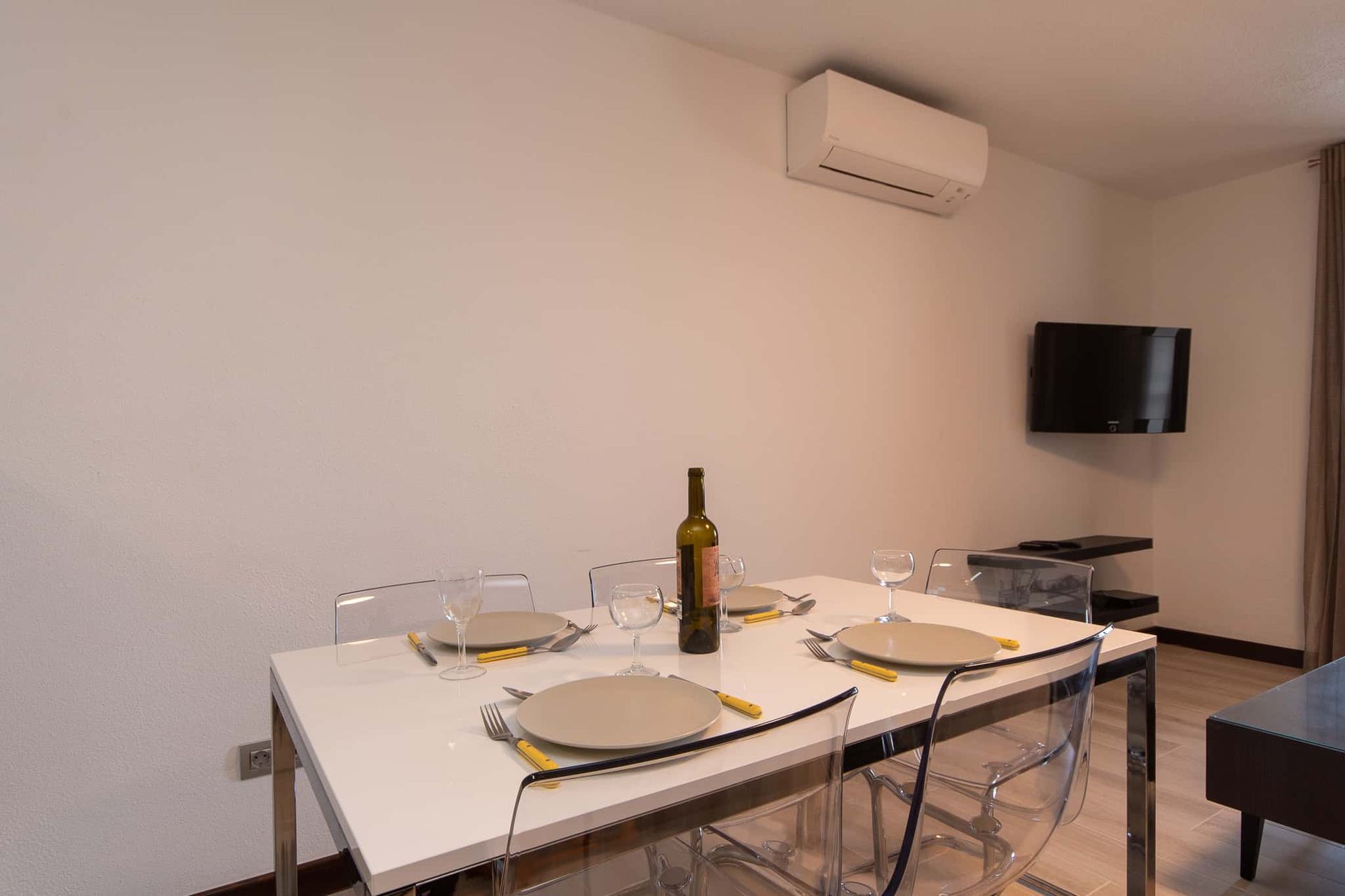 Dining table and chairs, air conditioning at Parque Santiago II, Playa de las Americas, Tenerife