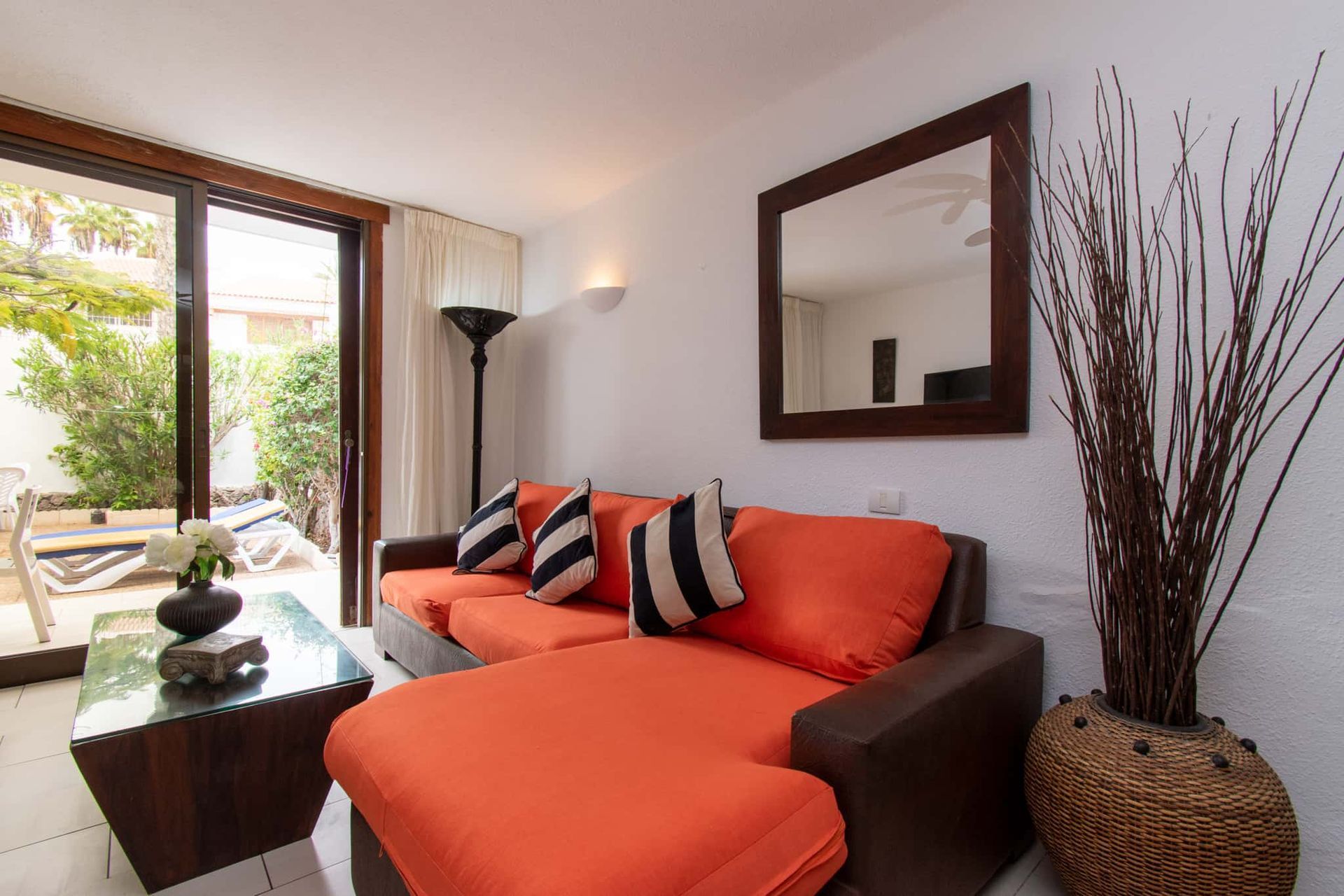 Lounge with sofa, coffee table, mirror, lamp, Parque Santiago I, Playa de las Americas, Tenerife