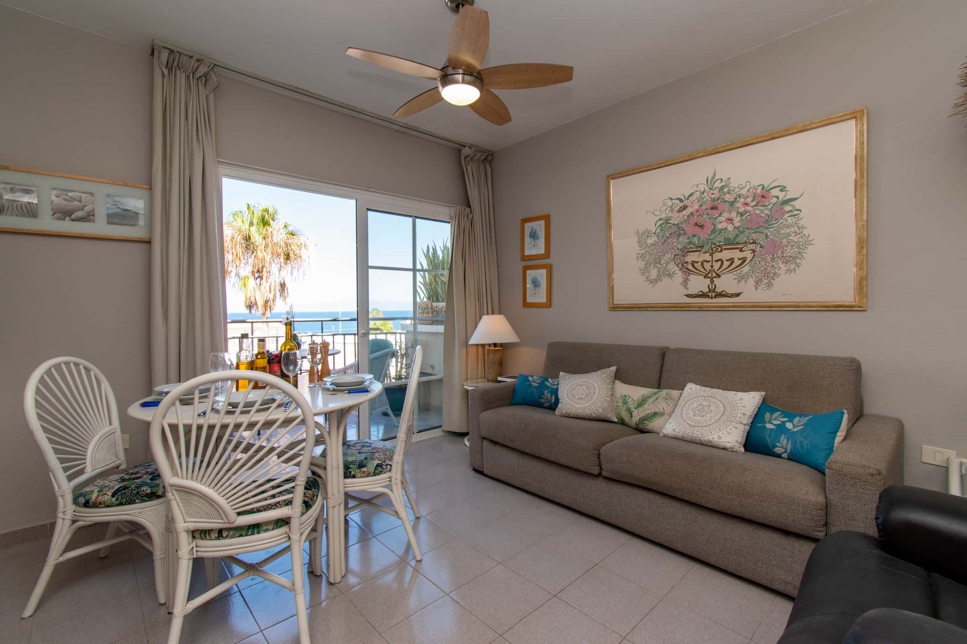 Sofa, dining table and chairs, ceiling fan at Los Olivos, Costa Adeje, Tenerife.
