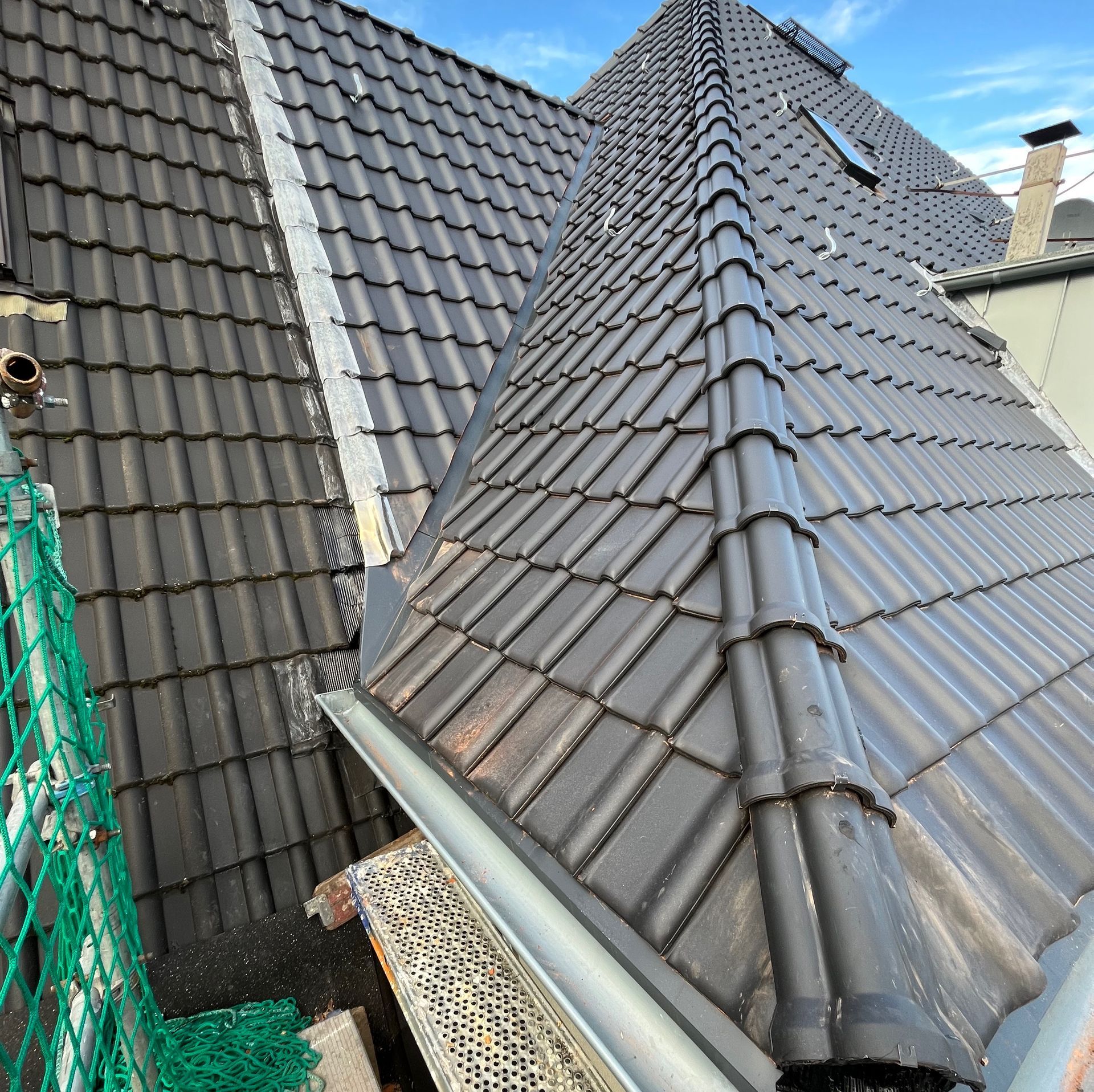 Dachdecker Essen Dachdecker Mülheim an der Ruhr Steildachsanierung Laumanns Stehfalzgaube Rheinzink Clima Comfort Aufdachdämmung