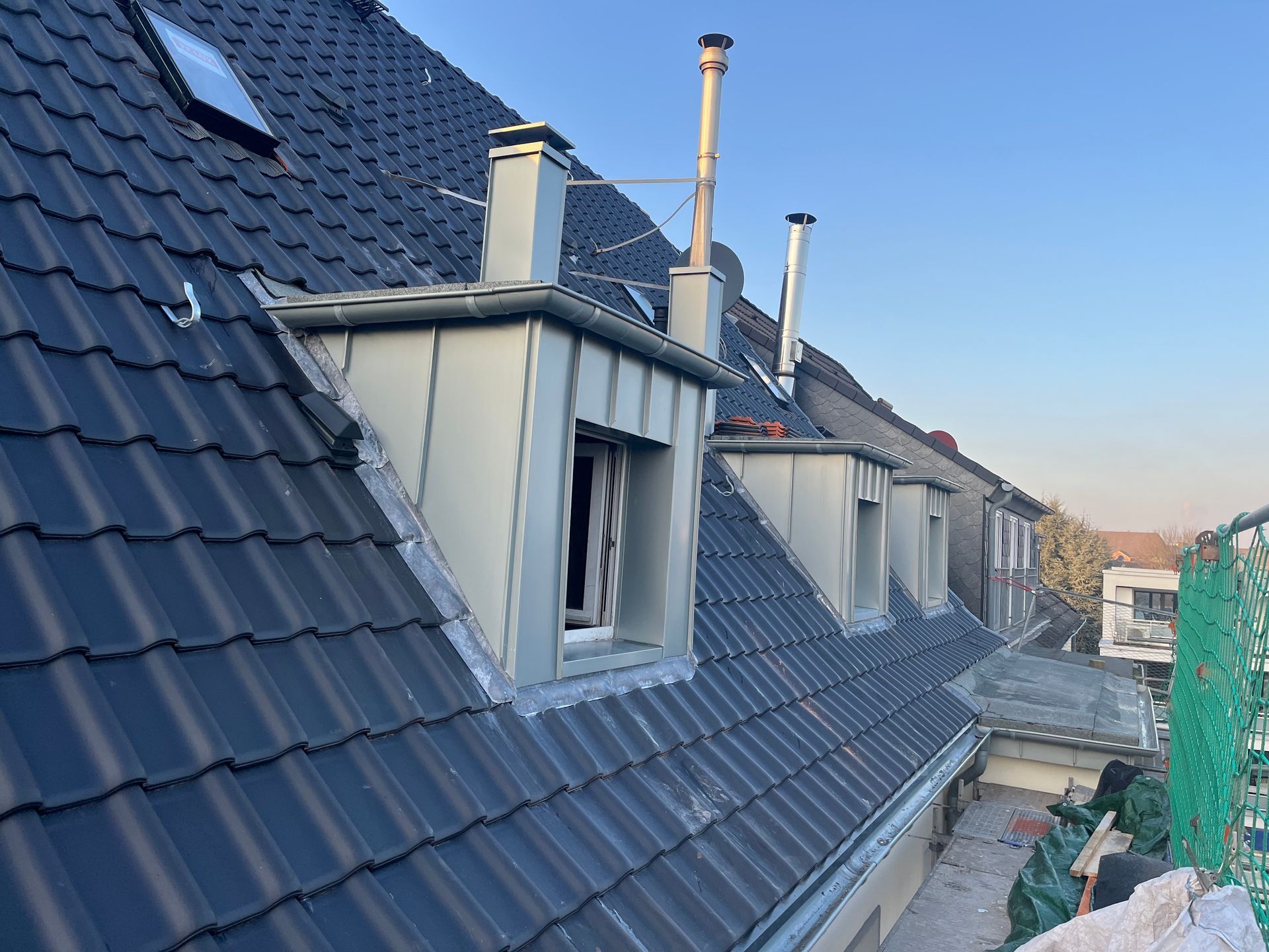 Dachdecker Essen Dachdecker Mülheim an der Ruhr Steildachsanierung Laumanns Stehfalzgaube Rheinzink Clima Comfort Aufdachdämmung