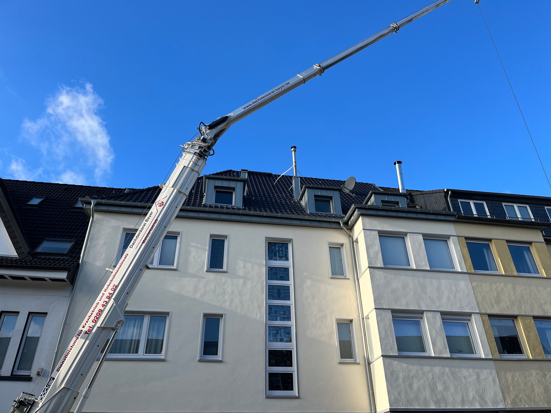 Dachdecker Essen Dachdecker Mülheim an der Ruhr Steildachsanierung Laumanns Stehfalzgaube Rheinzink Clima Comfort Aufdachdämmung