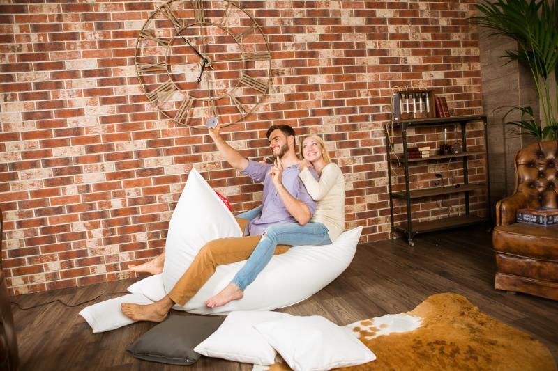 Kunden auf Sitzsack der HDI Dämmstoff-Vertriebs GmbH & Co.KG