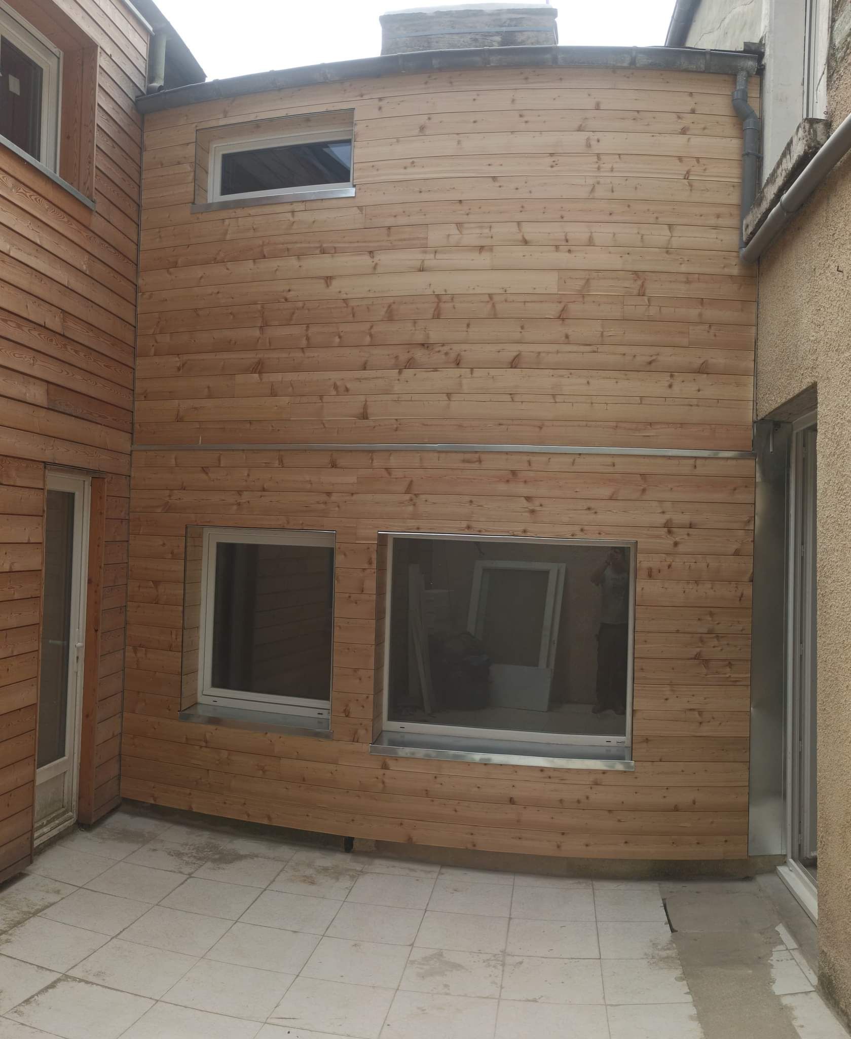 Bardage bois après ITE sur deux murs d'une maison