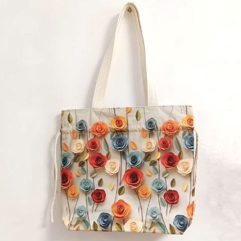 Una mesa blanca con un patrón floral azul y blanco sobre ella.
