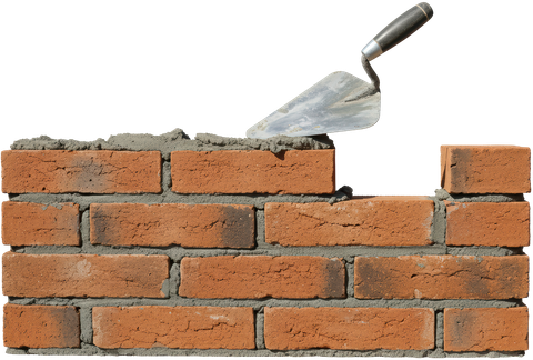 Lissage à la truelle du mortier frais sur un mur de briques en construction